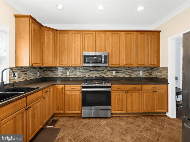 1121 Old Love Point Rd, Stevensville, MD 21666 - kitchen featuring dark countertops, crown molding, stainless steel appliances, and visible vents