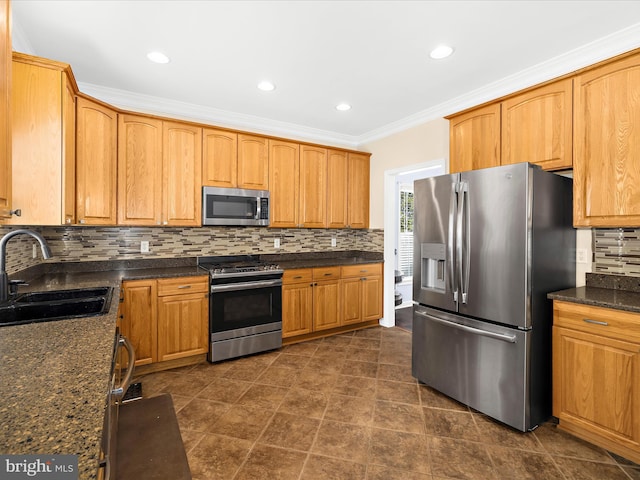 1121 Old Love Point Rd, Stevensville, MD 21666 - kitchen featuring recessed lighting, stainless steel appliances, ornamental molding, a sink, and tasteful backsplash