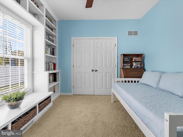 1121 Old Love Point Rd, Stevensville, MD 21666 - sitting room featuring visible vents, a ceiling fan, baseboards, and light carpet