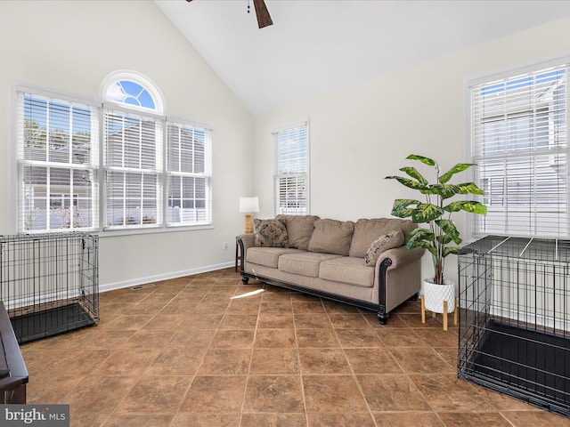 1121 Old Love Point Rd, Stevensville, MD 21666 - living room featuring baseboards, high vaulted ceiling, and ceiling fan