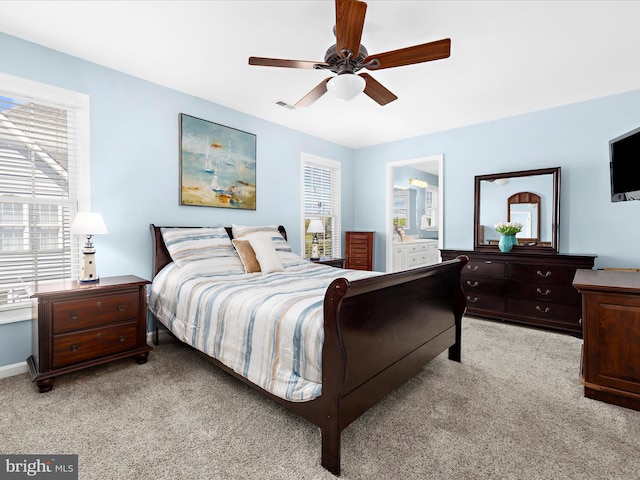 1121 Old Love Point Rd, Stevensville, MD 21666 - bedroom with ceiling fan, light carpet, and visible vents