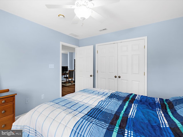 1121 Old Love Point Rd, Stevensville, MD 21666 - bedroom with wood finished floors, visible vents, a closet, and ceiling fan