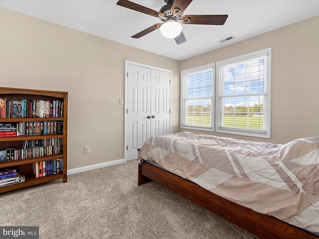 1121 Old Love Point Rd, Stevensville, MD 21666 - carpeted bedroom featuring baseboards, a ceiling fan, visible vents, and a closet