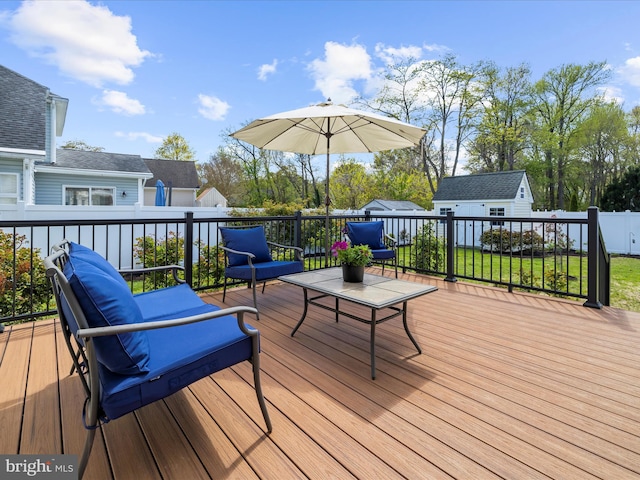 1121 Old Love Point Rd, Stevensville, MD 21666 - wooden deck featuring an outdoor hangout area, an outdoor structure, and a yard