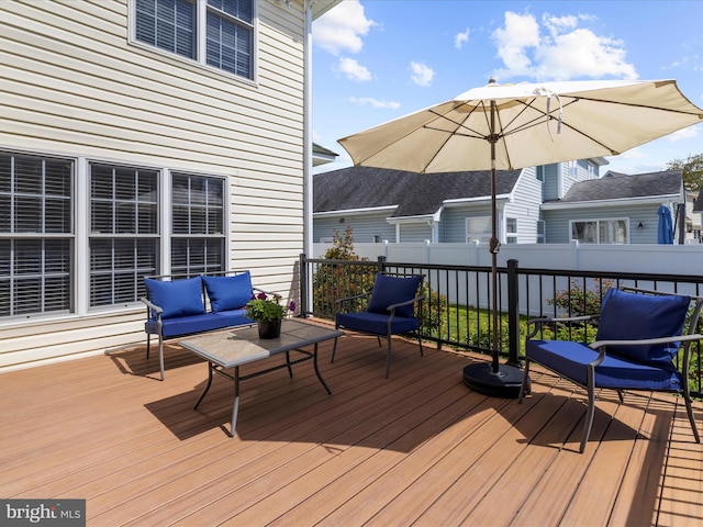 1121 Old Love Point Rd, Stevensville, MD 21666 - wooden terrace with outdoor lounge area