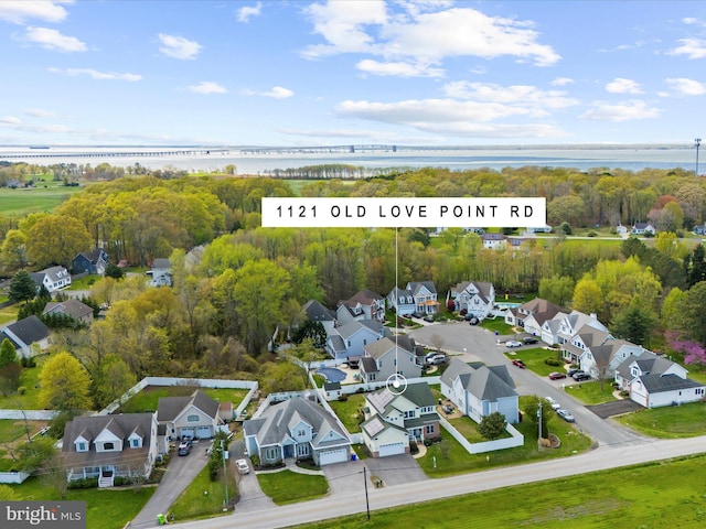 1121 Old Love Point Rd, Stevensville, MD 21666 - drone / aerial view featuring a residential view and a water view