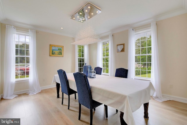 8177 Bodkin Ave, Pasadena, MD 21122 - dining room featuring baseboards, ornamental molding, light wood-style flooring, and recessed lighting