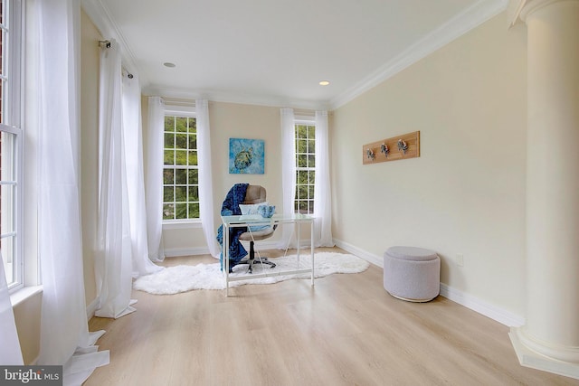 8177 Bodkin Ave, Pasadena, MD 21122 - sitting room with crown molding, wood finished floors, baseboards, ornate columns, and recessed lighting