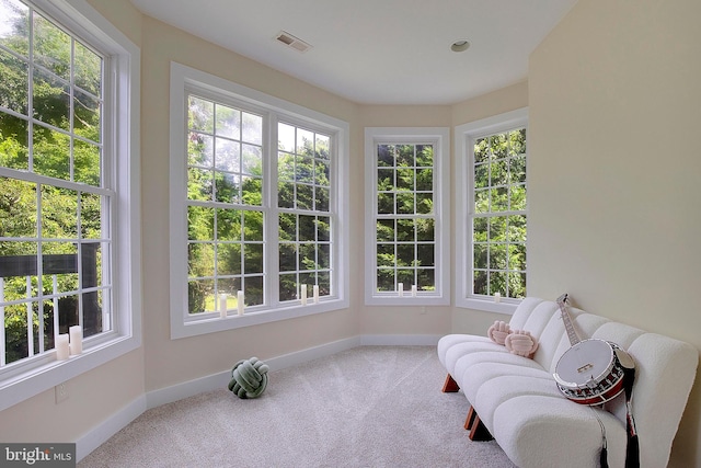 8177 Bodkin Ave, Pasadena, MD 21122 - sunroom featuring baseboards, visible vents, and a healthy amount of sunlight