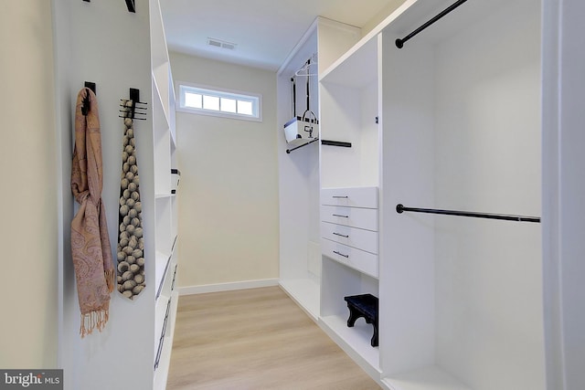 8177 Bodkin Ave, Pasadena, MD 21122 - walk in closet with light wood-style flooring and visible vents