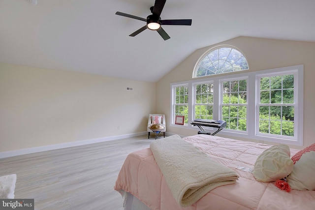 8177 Bodkin Ave, Pasadena, MD 21122 - bedroom with baseboards, light wood-style flooring, ceiling fan, and lofted ceiling
