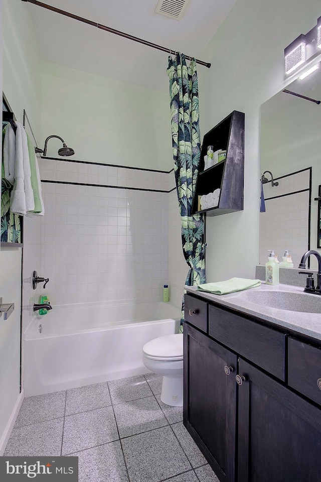 8177 Bodkin Ave, Pasadena, MD 21122 - full bath with vanity, visible vents, toilet, and shower / tub combo