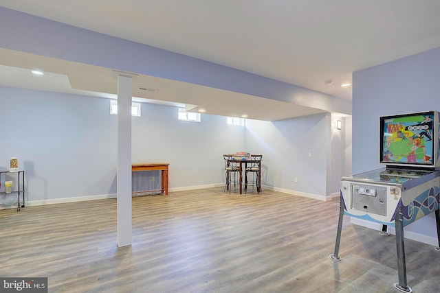 8177 Bodkin Ave, Pasadena, MD 21122 - recreation room featuring recessed lighting, baseboards, visible vents, and wood finished floors