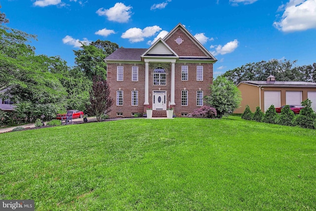 8177 Bodkin Ave, Pasadena, MD 21122 - view of front of home featuring brick siding and a front lawn