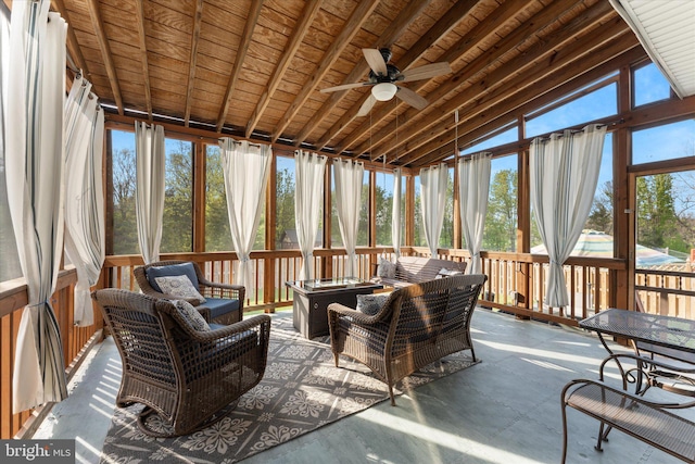 sunroom / solarium with a ceiling fan and an outdoor hangout area