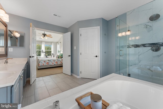 ensuite bathroom featuring a sink, visible vents, a shower stall, ceiling fan, and connected bathroom