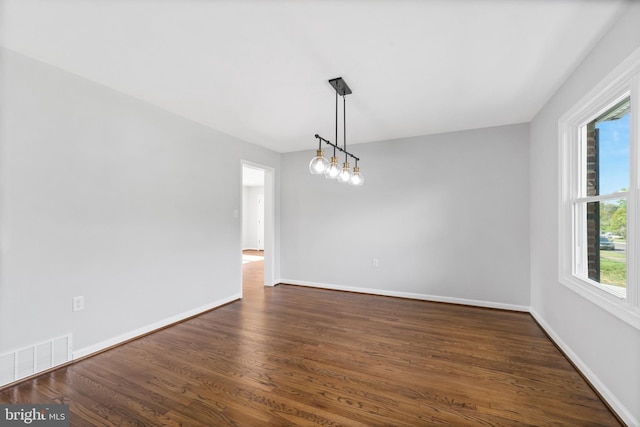 3 Amherst Dr, Newark, DE 19711 - spare room featuring dark wood-style flooring and baseboards
