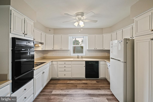 103 Cromwell Ave, Glen Burnie, MD 21061 - kitchen featuring a warming drawer, a sink, dark wood-style floors, a ceiling fan, and black appliances