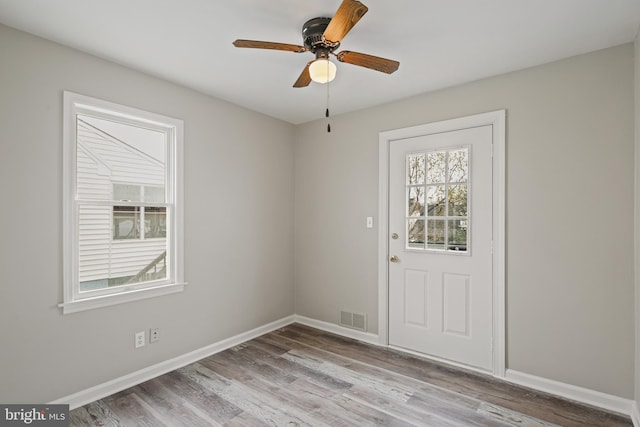 103 Cromwell Ave, Glen Burnie, MD 21061 - interior space featuring baseboards, visible vents, a ceiling fan, and wood finished floors