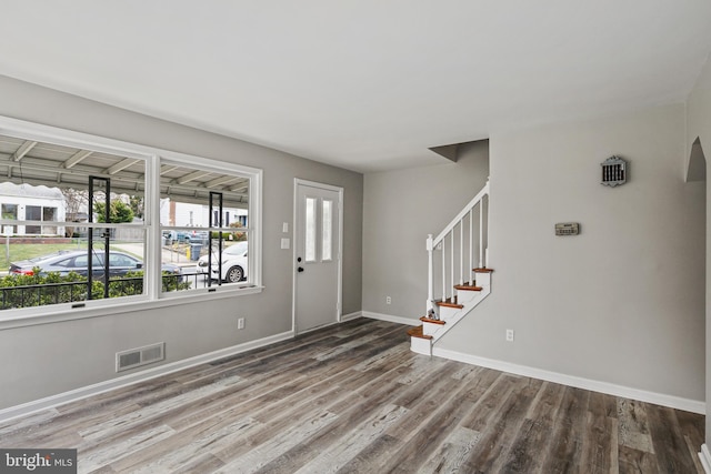 103 Cromwell Ave, Glen Burnie, MD 21061 - foyer entrance featuring baseboards, visible vents, wood finished floors, and stairway