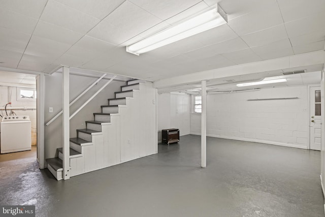 103 Cromwell Ave, Glen Burnie, MD 21061 - basement featuring concrete block wall, washer / clothes dryer, visible vents, and stairway