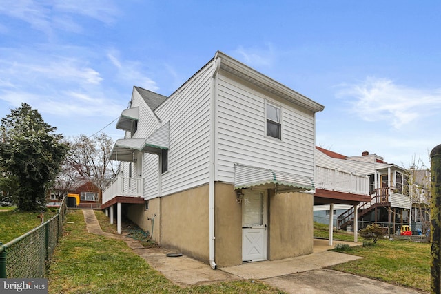 103 Cromwell Ave, Glen Burnie, MD 21061 - view of home's exterior with stairs, fence, and a yard