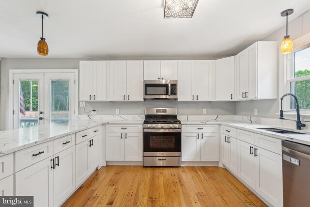 19316 Landora Bridge Rd, Ruther Glen, VA 22546 - kitchen with appliances with stainless steel finishes, a sink, and white cabinets