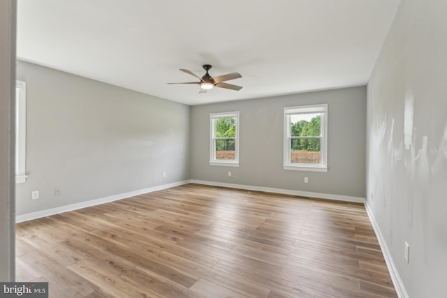 19316 Landora Bridge Rd, Ruther Glen, VA 22546 - spare room featuring a ceiling fan, light wood finished floors, and baseboards