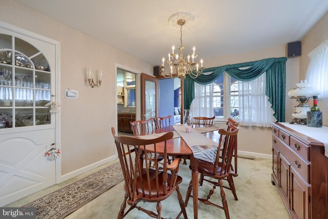 3902 Reiff Pl, Reading, PA 19606 - dining room with baseboards and a chandelier