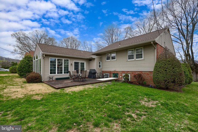 3902 Reiff Pl, Reading, PA 19606 - rear view of house featuring a yard and a wooden deck