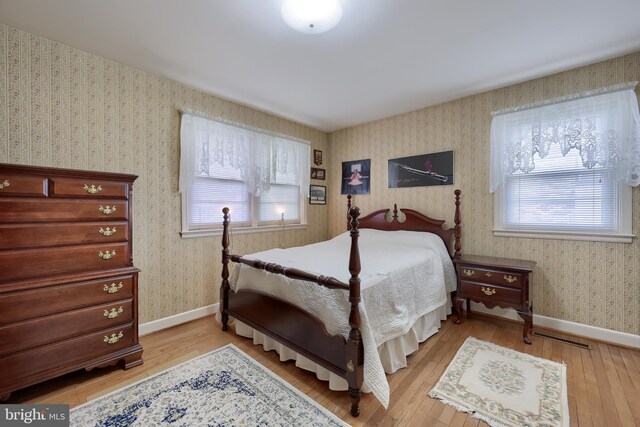 3902 Reiff Pl, Reading, PA 19606 - bedroom featuring light wood finished floors, baseboards, and wallpapered walls