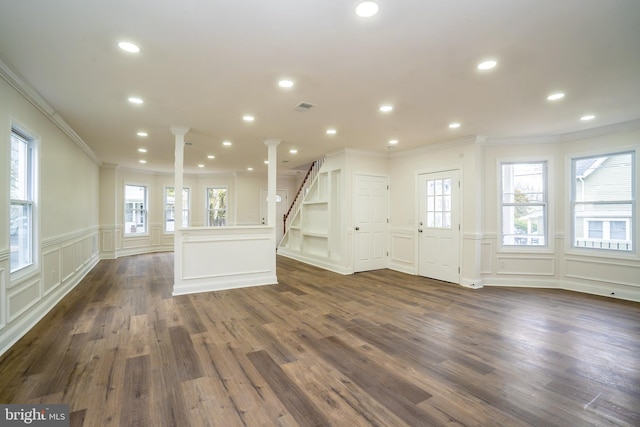 201 Morrison Ave, Hightstown, NJ 08520 - unfurnished living room with ornamental molding, a healthy amount of sunlight, and ornate columns
