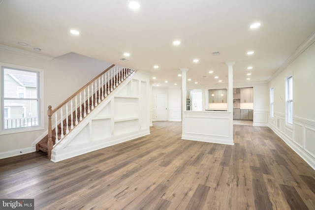 201 Morrison Ave, Hightstown, NJ 08520 - unfurnished living room with stairs, ornamental molding, wood finished floors, and decorative columns