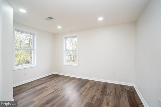 201 Morrison Ave, Hightstown, NJ 08520 - empty room featuring baseboards, visible vents, recessed lighting, and dark wood-style flooring