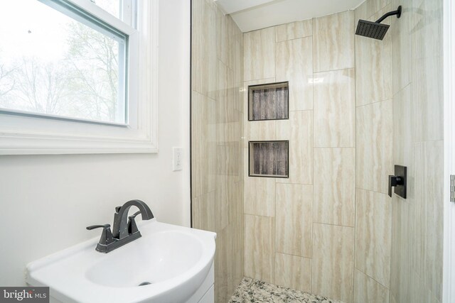 201 Morrison Ave, Hightstown, NJ 08520 - bathroom featuring a tile shower and a sink