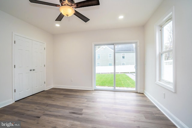 201 Morrison Ave, Hightstown, NJ 08520 - unfurnished bedroom with recessed lighting, baseboards, access to outside, and wood finished floors