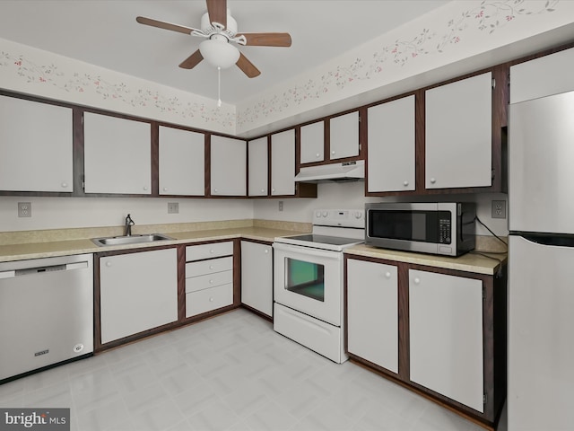 30 Drawbridge Ct, Baltimore, MD 21228 - kitchen featuring a ceiling fan, appliances with stainless steel finishes, a sink, light countertops, and under cabinet range hood