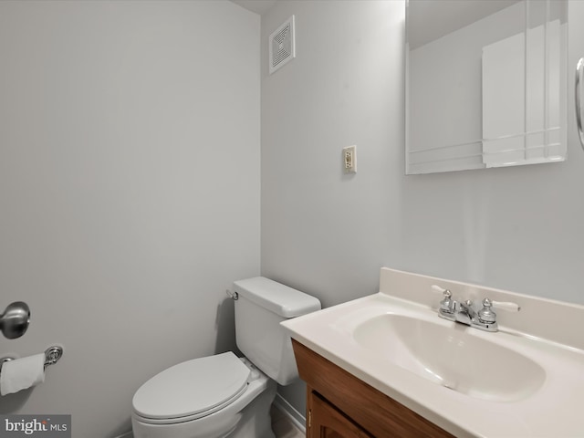 30 Drawbridge Ct, Baltimore, MD 21228 - half bath featuring vanity, toilet, and visible vents