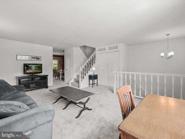 30 Drawbridge Ct, Baltimore, MD 21228 - carpeted living room with visible vents and a chandelier