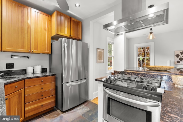 2819 S Joyce St, Arlington, VA 22202 - kitchen featuring stainless steel appliances, extractor fan, brown cabinetry, and dark stone counters