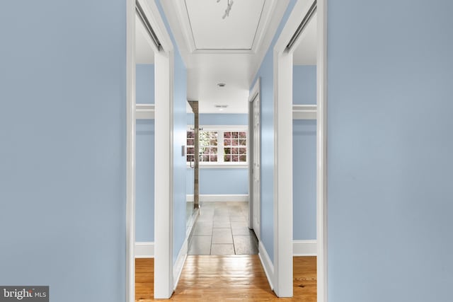 2819 S Joyce St, Arlington, VA 22202 - hallway featuring wood finished floors and baseboards