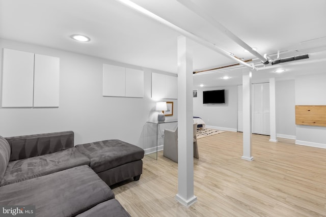 2819 S Joyce St, Arlington, VA 22202 - living room with light wood finished floors, baseboards, and recessed lighting