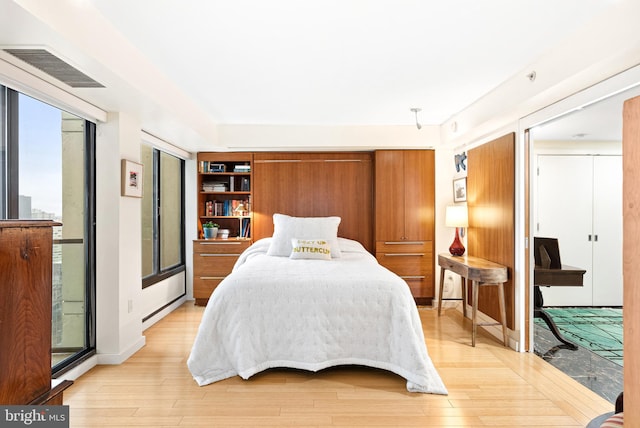 2001 Hamilton St Unit 1914, Philadelphia, PA 19130 - bedroom featuring light wood-type flooring