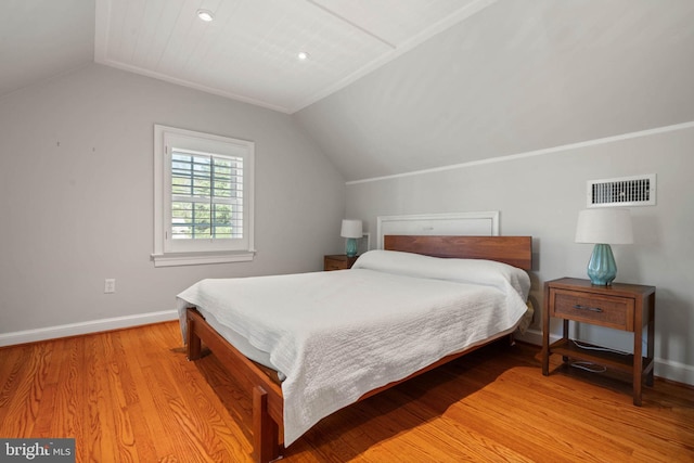 bedroom with baseboards, vaulted ceiling, recessed lighting, light wood-style flooring, and visible vents