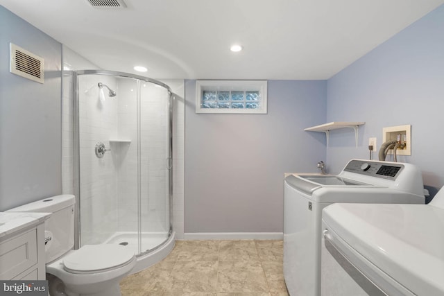 interior space with visible vents, baseboards, separate washer and dryer, laundry area, and recessed lighting
