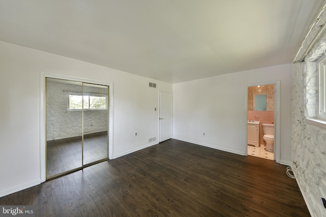 1556 Coolidge Ave, Abington, PA 19001 - unfurnished bedroom featuring dark wood-style floors, a closet, and connected bathroom
