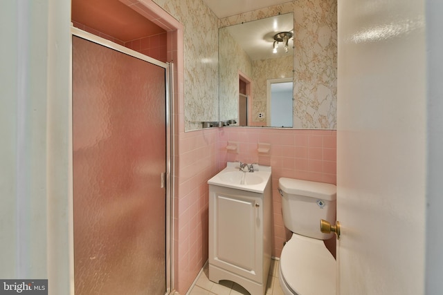 1556 Coolidge Ave, Abington, PA 19001 - bathroom with vanity, a stall shower, tile walls, and tile patterned floors