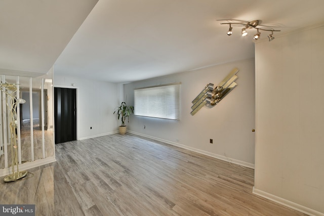 1556 Coolidge Ave, Abington, PA 19001 - unfurnished living room with wood finished floors and baseboards