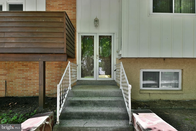 1556 Coolidge Ave, Abington, PA 19001 - doorway to property featuring french doors, brick siding, and board and batten siding