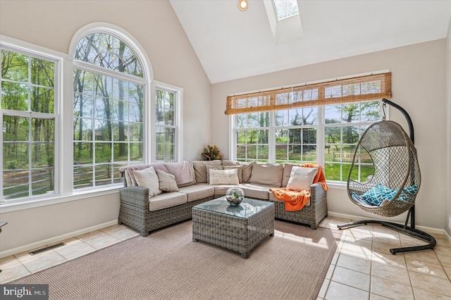 100 Fernwood Dr, Avondale, PA 19311 - sunroom with visible vents, a skylight, tile patterned floors, baseboards, and high vaulted ceiling